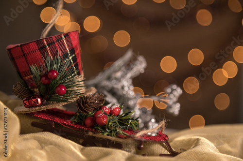 Closeup Holiday Snow Sled Christmas Ornament Background. Selective Focus With Copy Space. photo