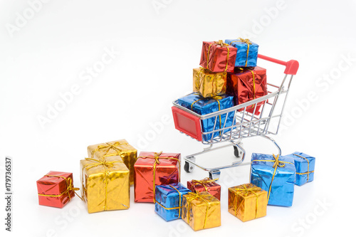 set colorful gift boxes with trolley on white background