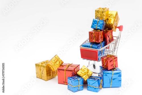 set colorful gift boxes with trolley on white background