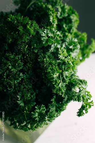 A lot of useful parsley on a light background