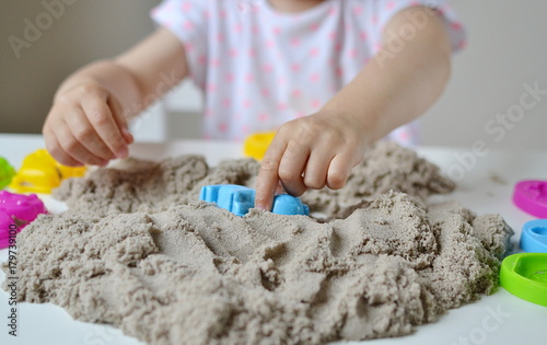 Little Girl Playing with Kinetic Sand at Home Early Education Preparing for School Development, Children Game