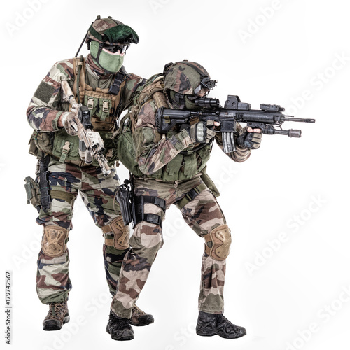 Paratroopers of french 1st Marine Infantry Parachute Regiment RPIMA studio shot firing pointing weapons