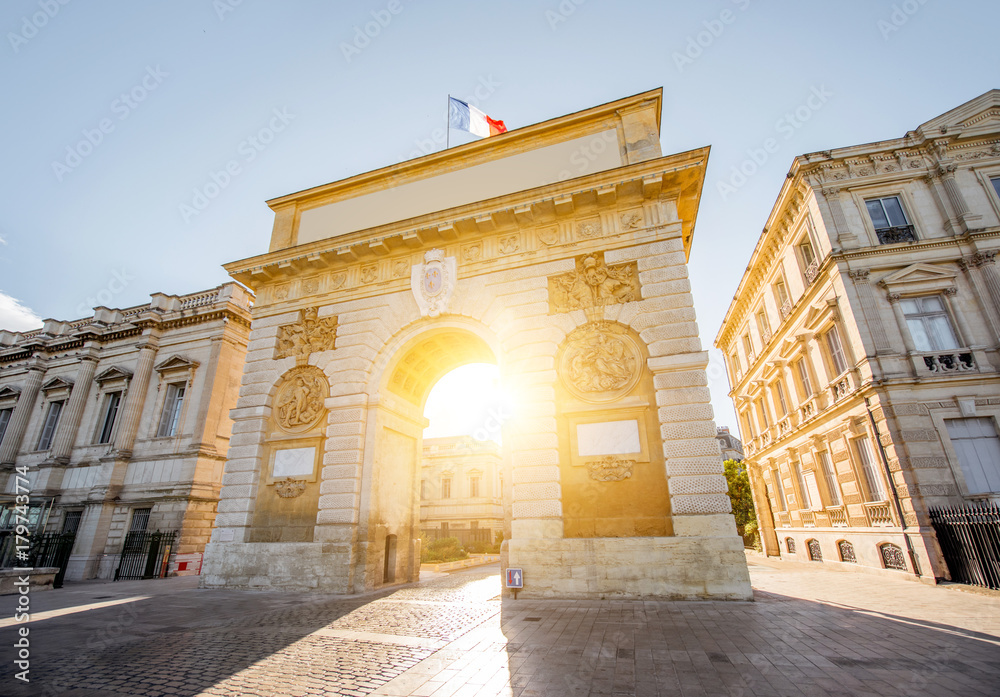 Street view with Triumphal Arch during the sunrise in Montpellier city in Occitanie region of France