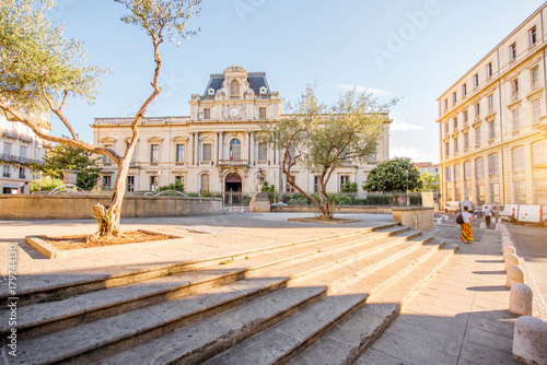 City view on Martyrs square with beautiful building during the morning light in Montpellier city in southern France photo