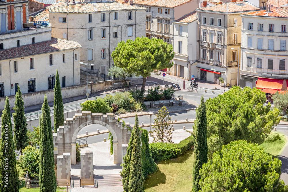 Fototapeta premium Aerial cityscape view on the old town with ruins in Montpellier city during the sunny weather in Occitanie region of France
