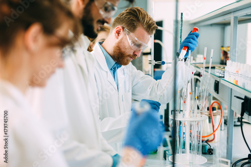 Group of chemistry students working in laboratory