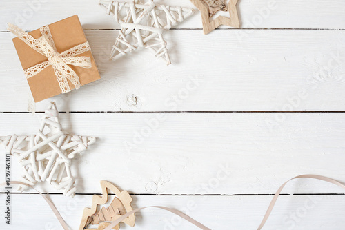 mockup Christmas composition. Christmas gift, star on wooden white background. Flat lay, top view photo