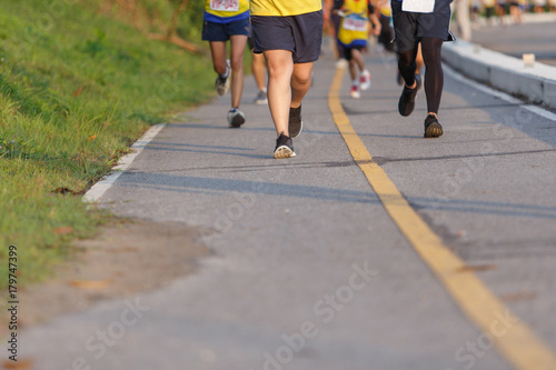Marathon running race, Run up the mountain road. © Somkiat