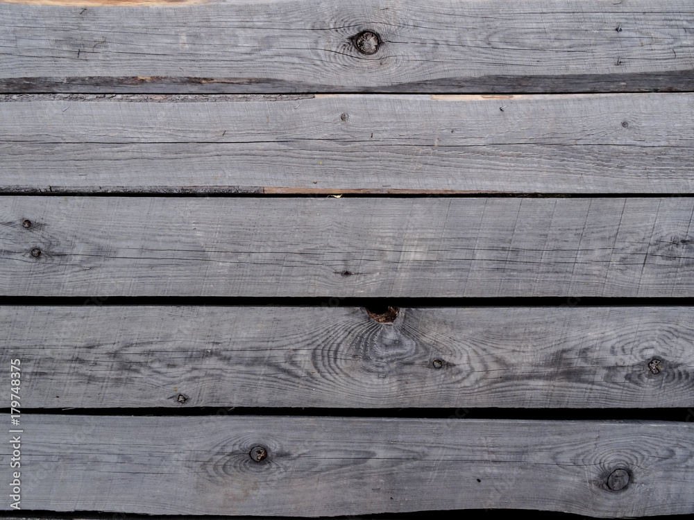 Grey unplaned boards. Grey unplaned boards.