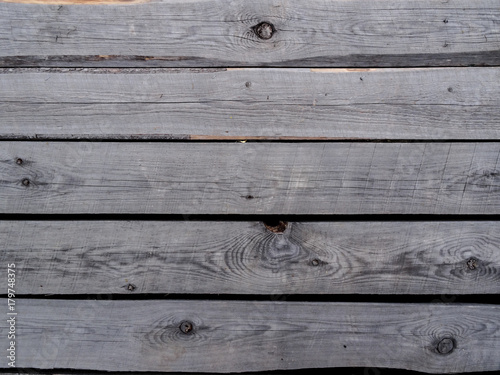 Grey unplaned boards.