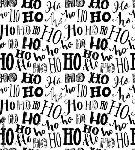 Seamless texture with repeating word Ho written in different styles of handmade typography. Christmas wrapping paper. Santa Claus laugh. Bold black and white pattern.