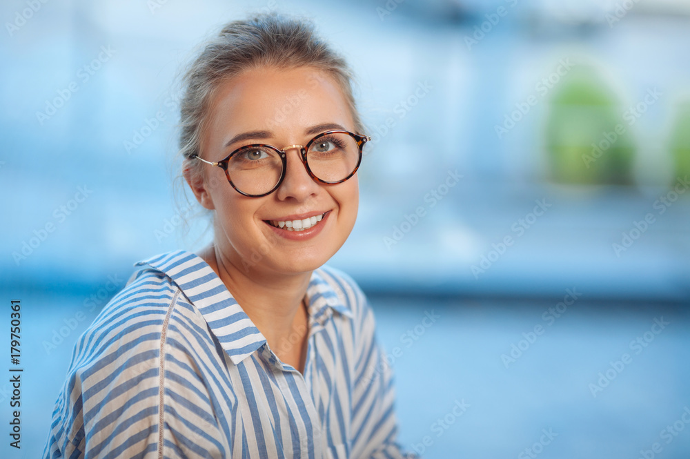 Portrait of a cheerful delighted woman