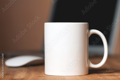Obraz na plátně White mug on the desktop