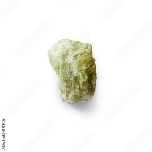Green spodumene crystals isolated on white background