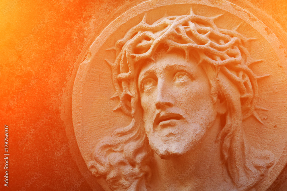 The face of Jesus Christ in a crown of thorns as a symbol of suffering and salvation of mankind. (healing, spiritual development, religious events - the concept)