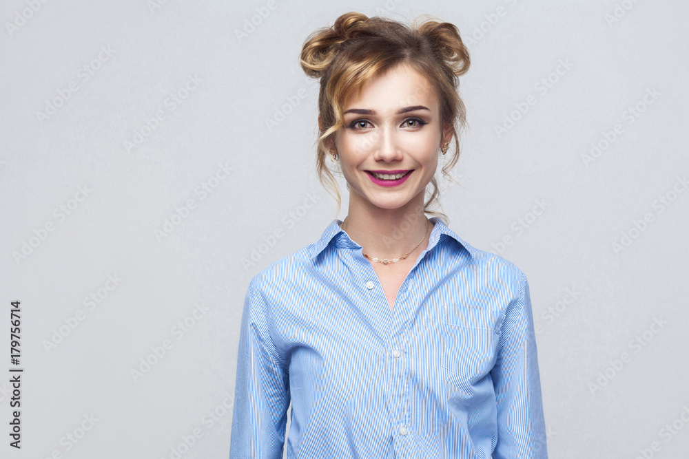 Happiness young adult success woman, looking at camera and toothy smile.