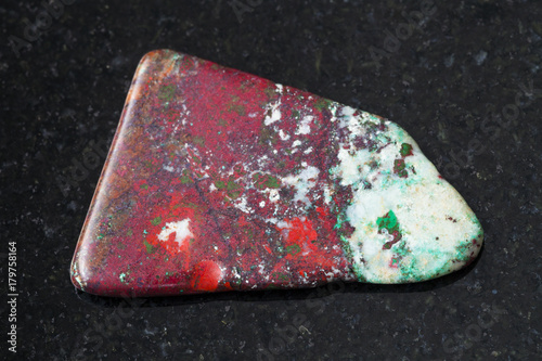 tumbled red Cuprite and green Chrysocolla on dark