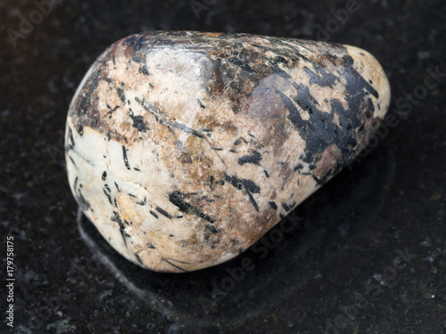 aegirine in tumbled Sanidine and nepheline stone photo