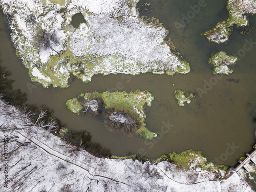 Dam on the river Klyazma landscape. First snow. Aerial view photo