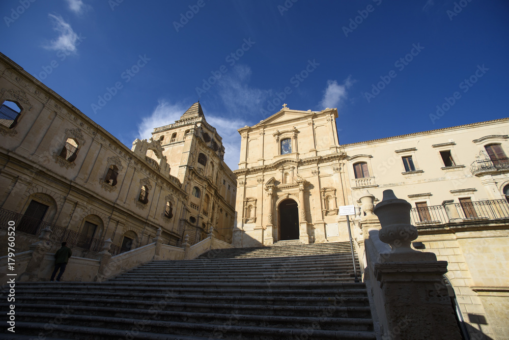 Facade and stairs of the Church of Saint Francis Immaculate in the Noto, Sicily, Italy