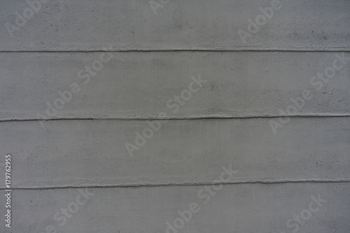grey concrete wall with horizontal lines background structure