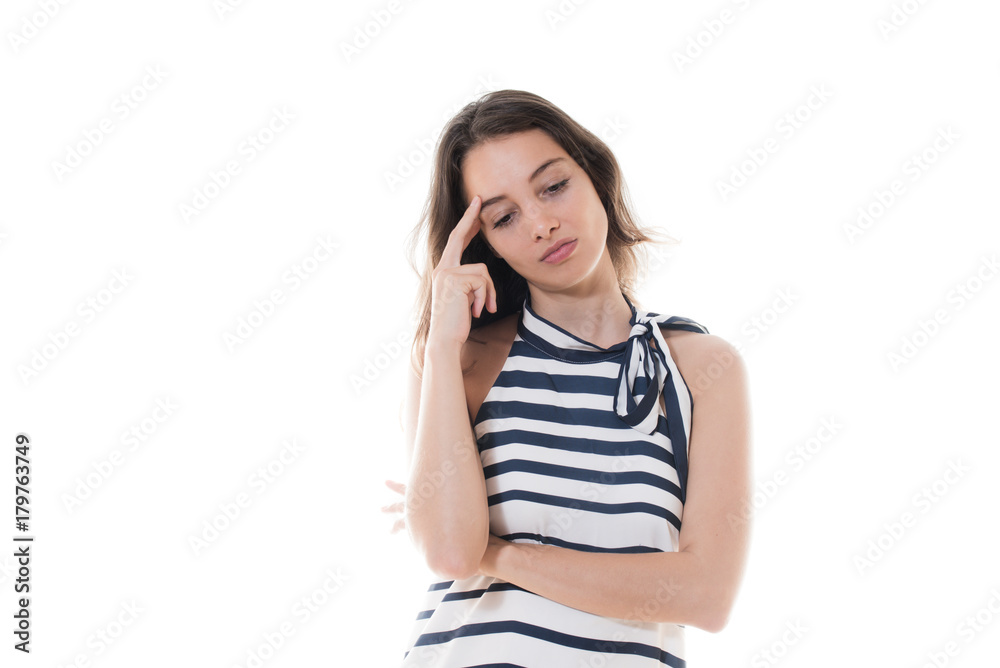 Woman making a choice looking down emotive concept Woman making a choice looking down emotive concept