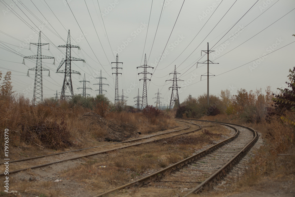 Industrial foggy landscape - old abandoned industrial zone in autumn forest Industrial foggy landscape - old abandoned industrial zone in autumn forest