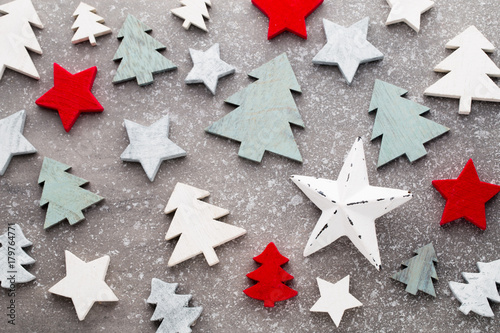 Christmas wooden decor on the snow background.