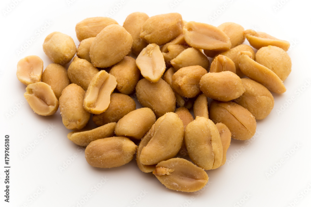 Peeled peanuts on the isolated background. Peeled peanuts on the isolated background.