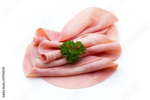 Sliced boiled ham sausage isolated on white background, top view.