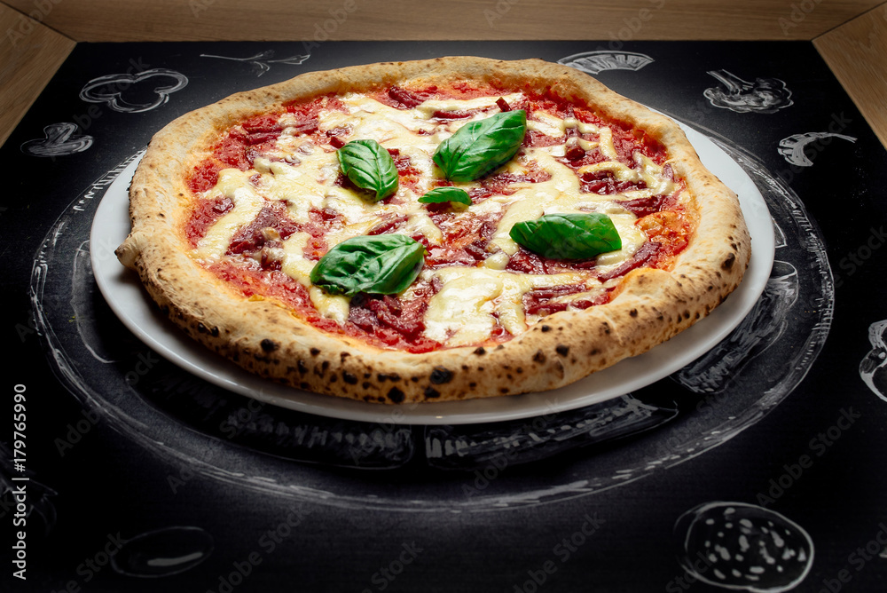 Fototapeta premium Hot pizza with cheese