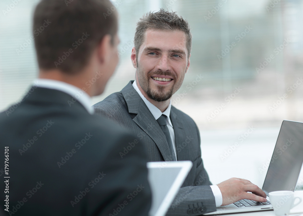 closeup.business partners discussing business issues closeup.business partners discussing business issues