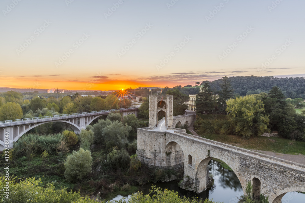The Medieval Bridge in the ancient town of Besalu at sunrise