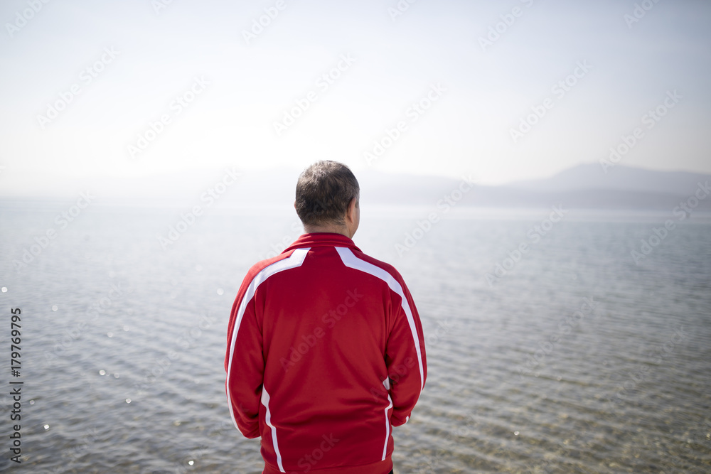 Back Of Senior Man Looking At Sea Sunny Day Back Of Senior Man Looking At Sea Sunny Day