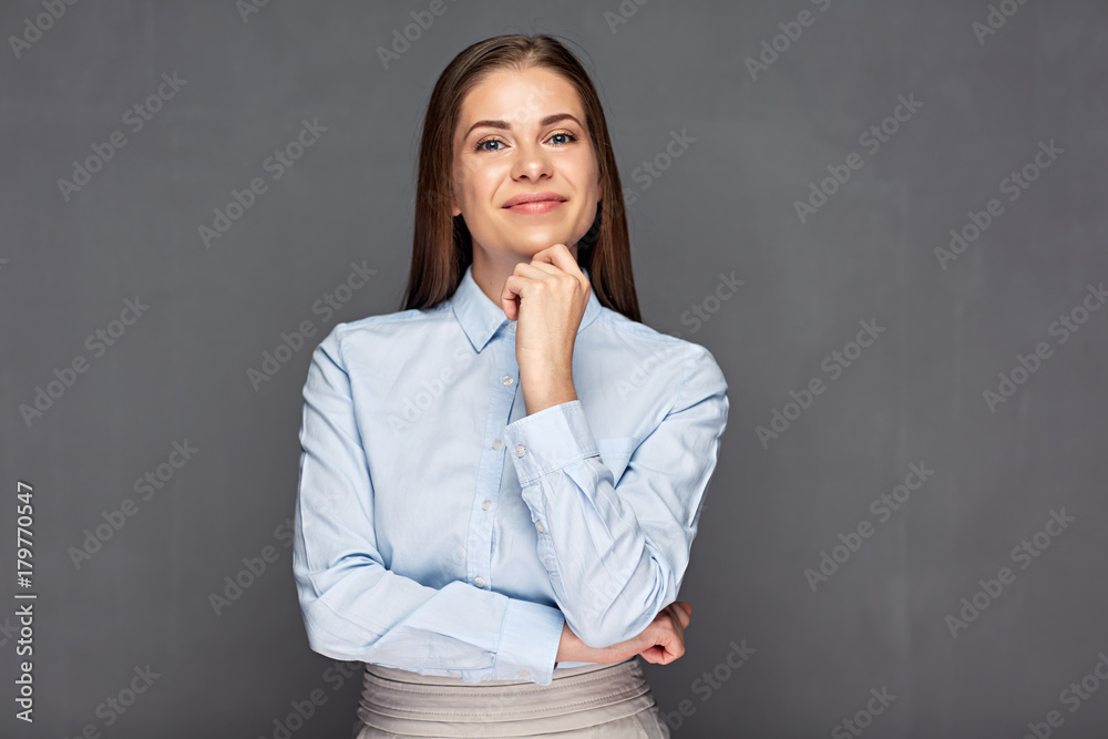 Portrait of thinking business woman on gray Portrait of thinking business woman on gray
