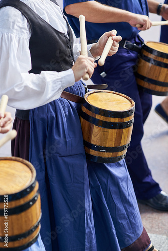 Citizens drumming in Tamborrada, the drum parade to commemorate the day that allied Anglo-Portuguese troops invaded the city. Basque Country, Guipuzcoa. Spain. photo