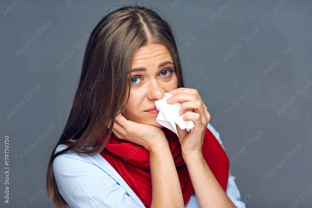 Allergies or flu sickness woman holding paper tissue Allergies or flu sickness woman holding paper tissue