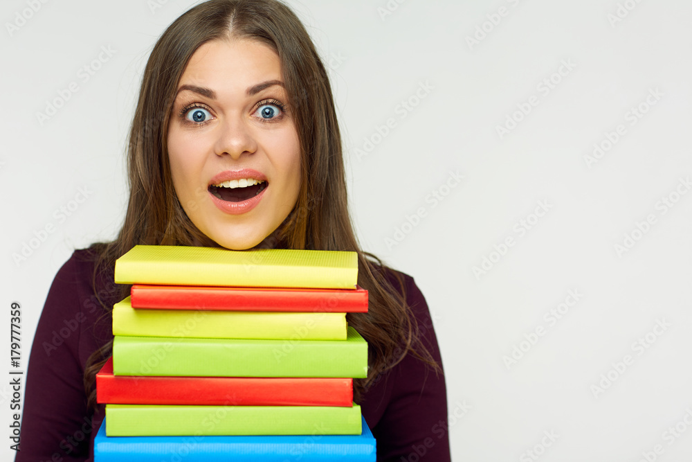 Close up portrait of student girl with books pile. Close up portrait of student girl with books pile.