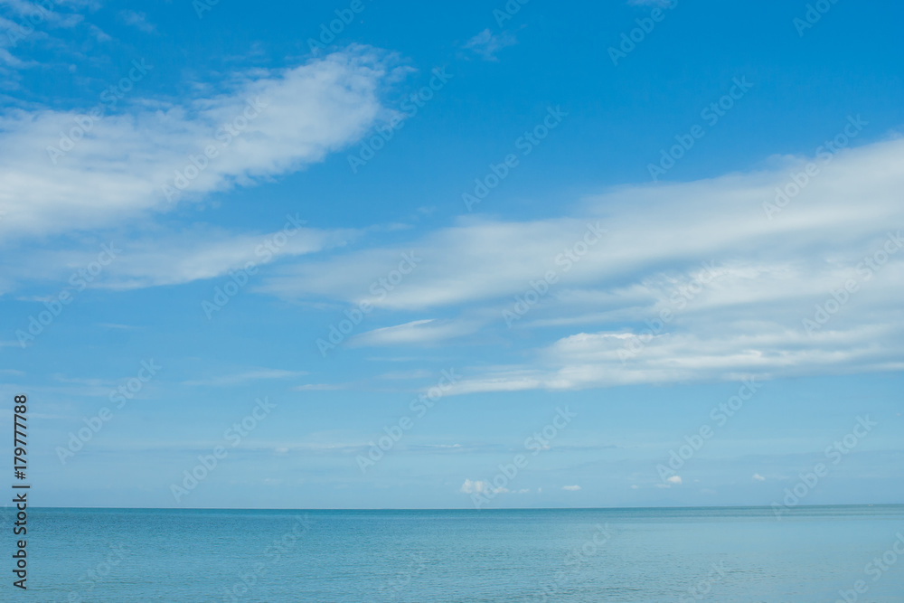 Beautiful seascape view of blue sea and sky in the background at summer time.