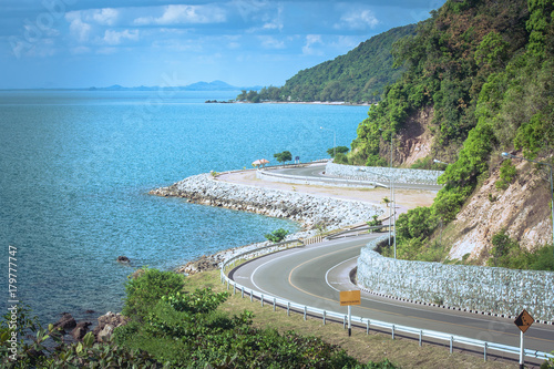Beautiful Seascape Viewpoint of the road beside blue sea that is landmark at Kung Wiman Bay in Chanthaburi Province, Thailand.