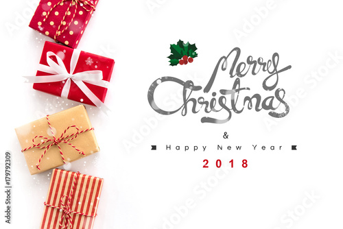 Merry Christmas and Happy New Year 2018 text on white background with gift boxes