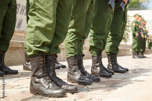 The soldier's footwear which is put on legs, army boots