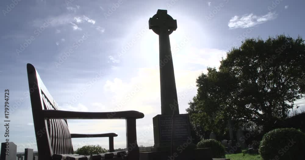 Low angle war memorial with light shining through Low angle war memorial with light shining through