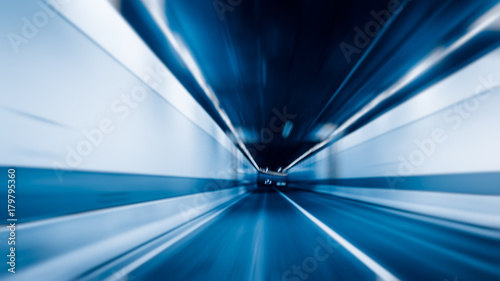 abstract car driving through tunnel, blue tone images.