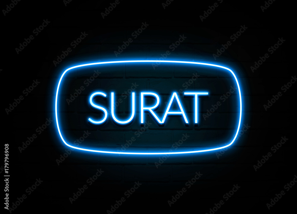 Surat  - colorful Neon Sign on brickwall