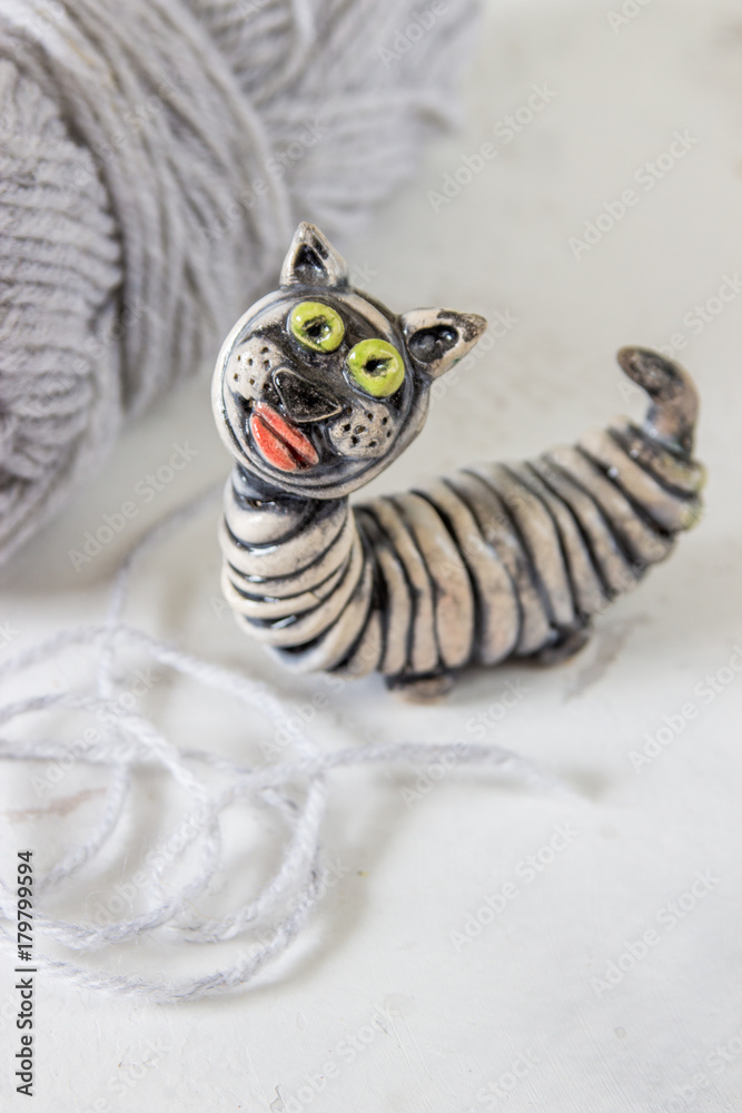 Obraz premium Ceramic cat. Handmade figure of cat