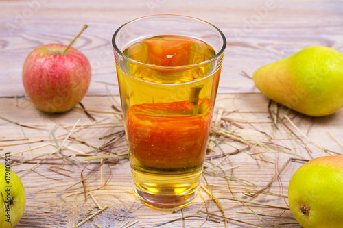 Cider on rustic wooden background with apples and pears, vhorizontal photo