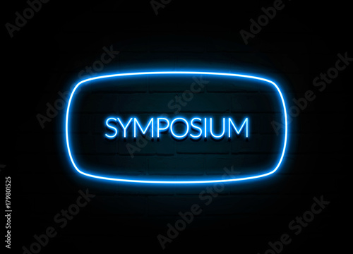 Symposium - colorful Neon Sign on brickwall