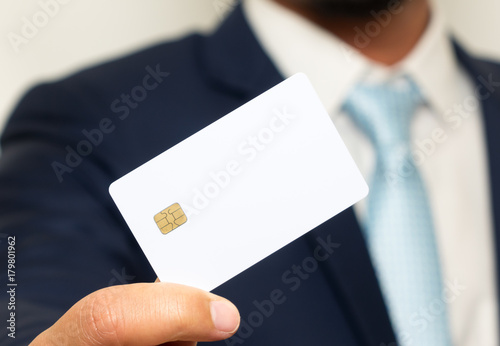 Man holding holding blank credit card
