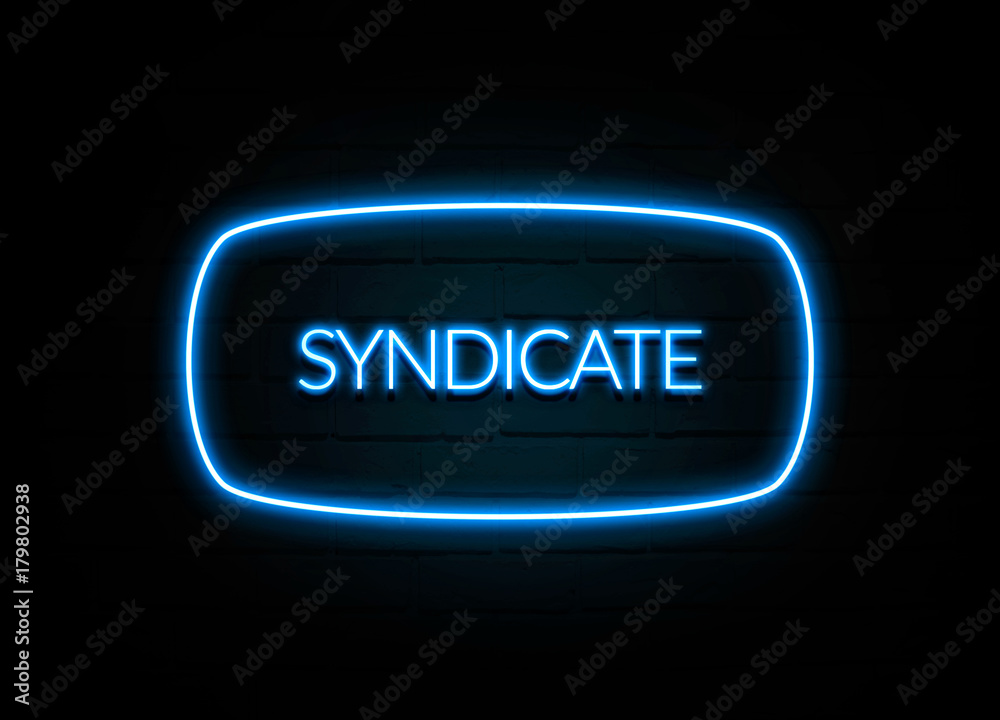 Syndicate  - colorful Neon Sign on brickwall